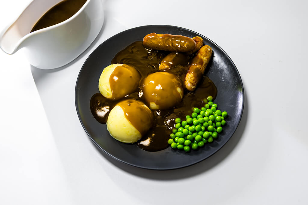Sausage & Mash with a jug of gravy