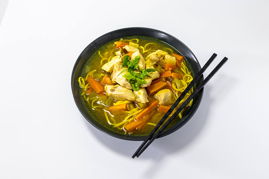 Ginger Chicken Noodle Soup with chopsticks