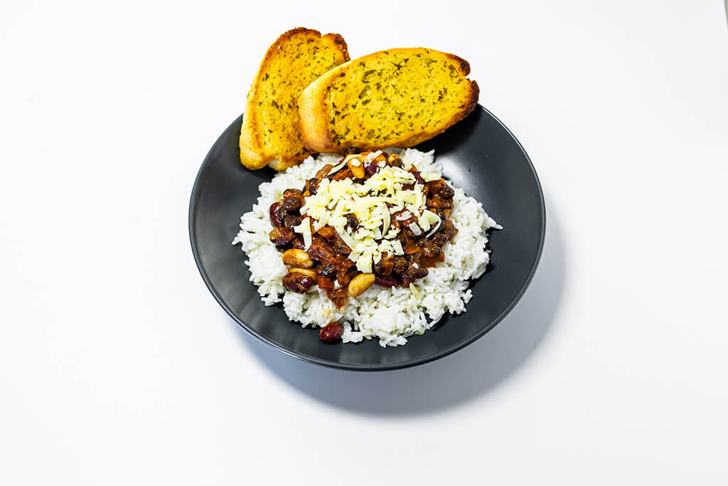 Three Bean Chilli with a side of garlic bread