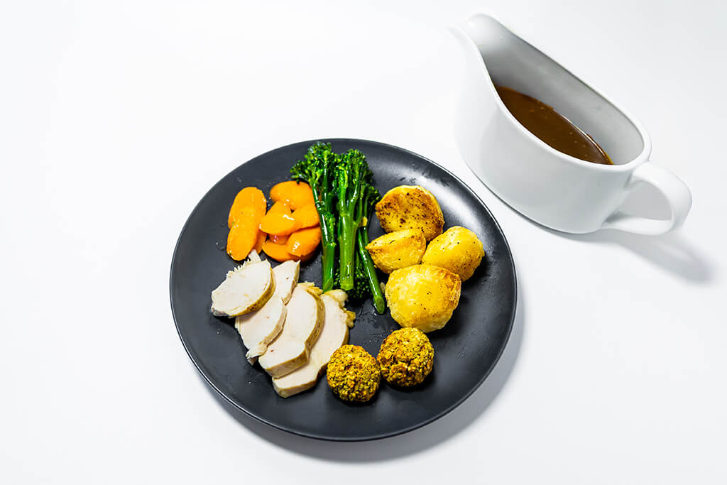 Chicken Roast Dinner with a jug of gravy